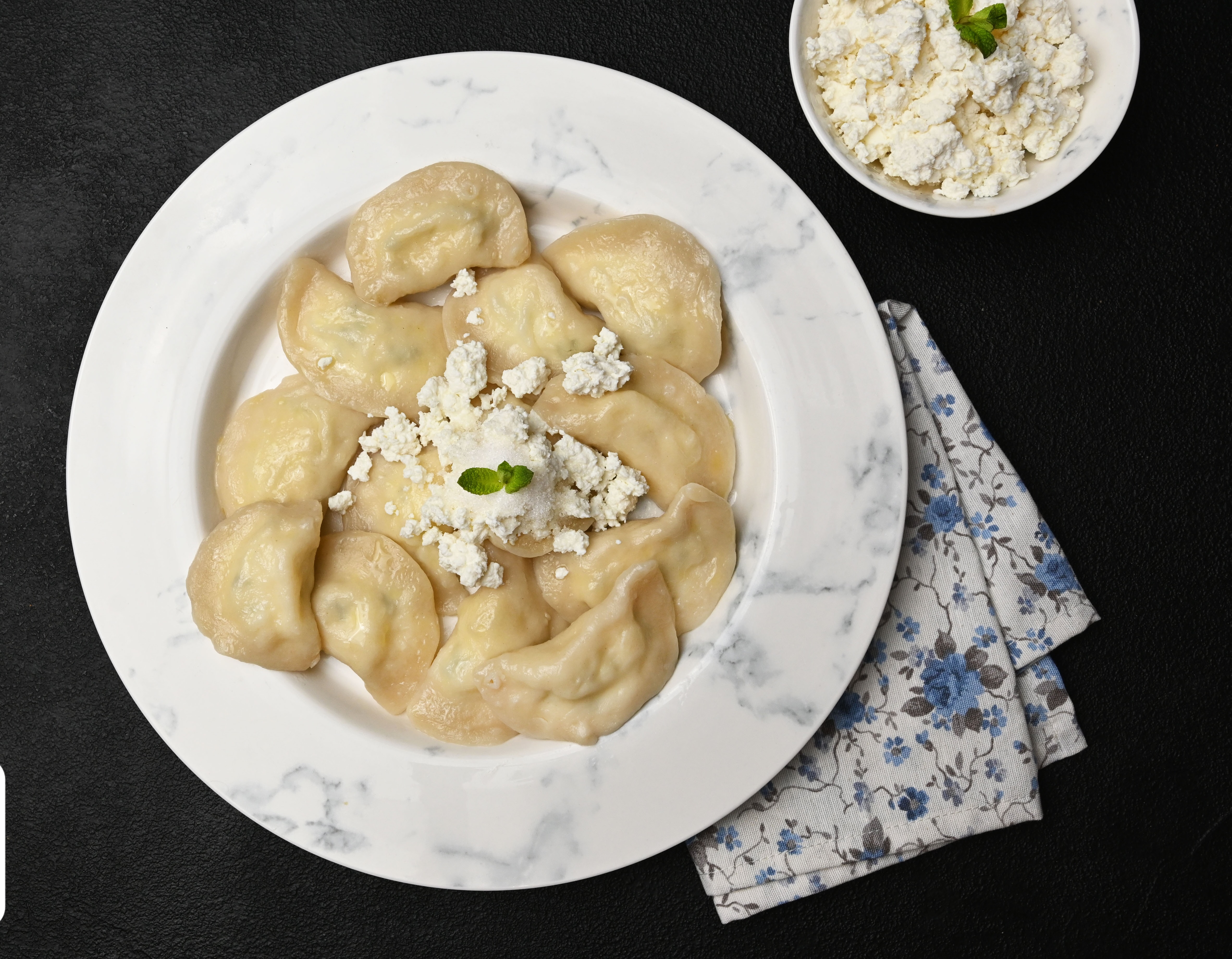 Sweet cheese varenyky (dumplings)