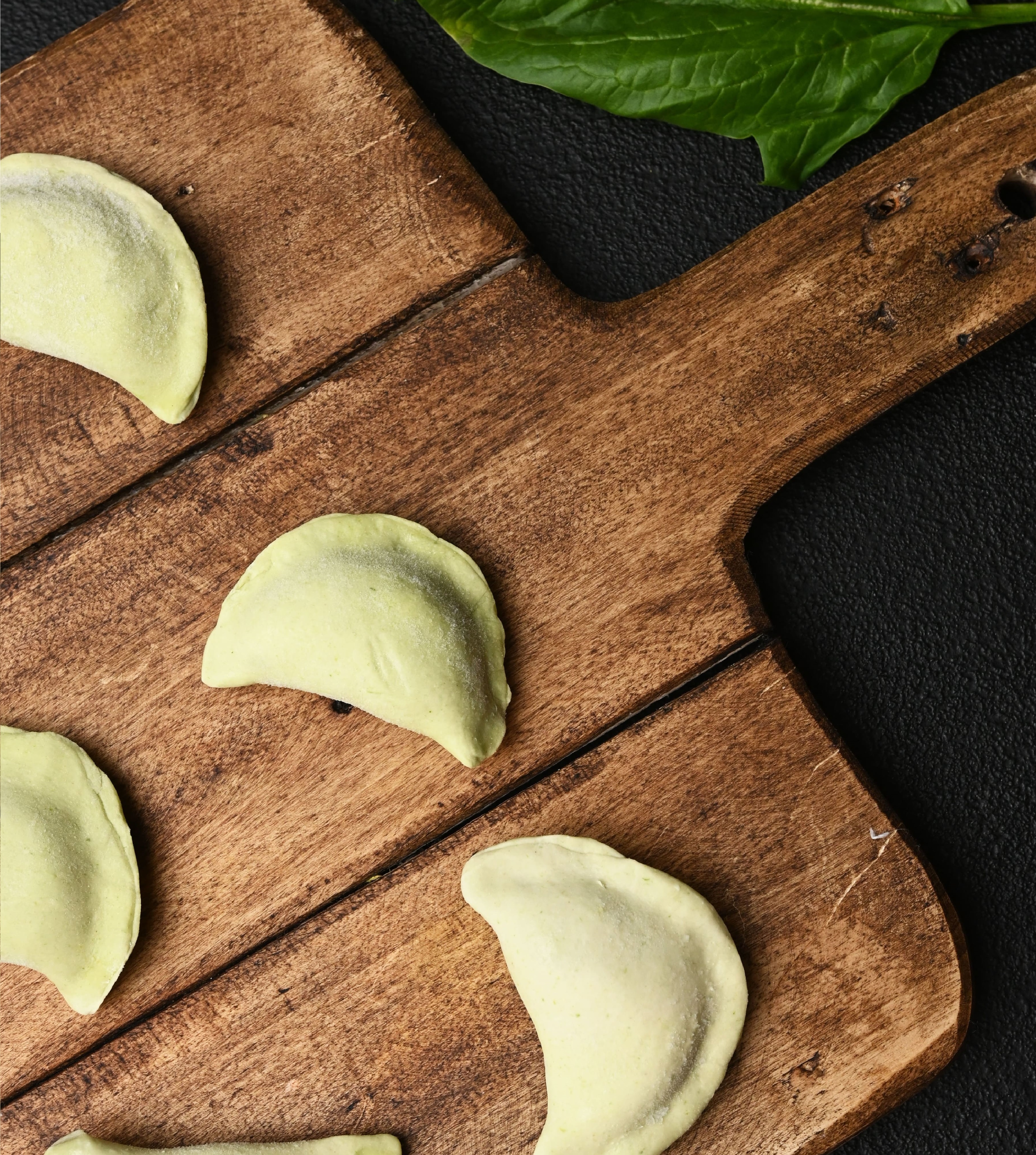 Spinach and brined cheese varenyky (dumplings)