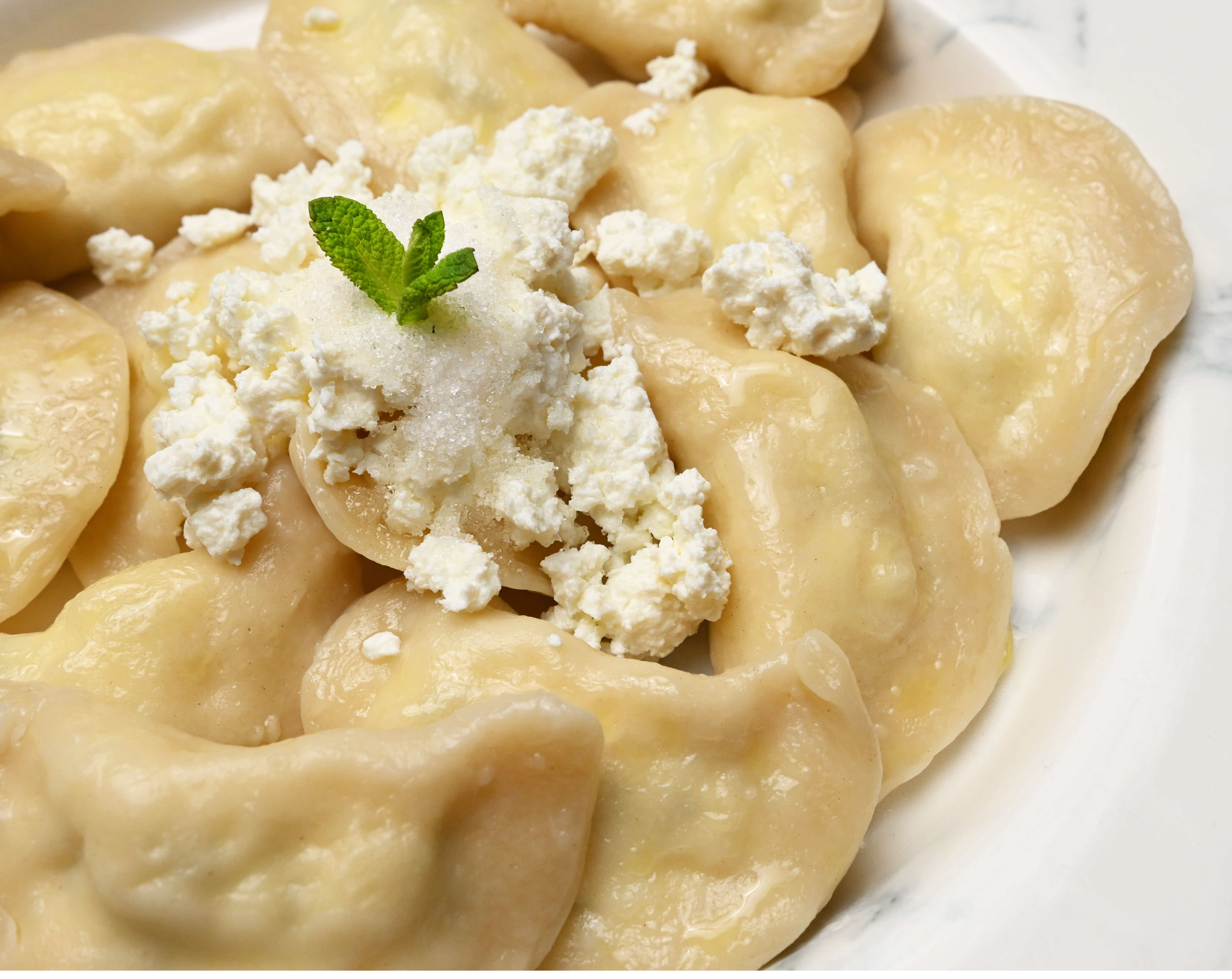 Sweet cheese varenyky (dumplings)