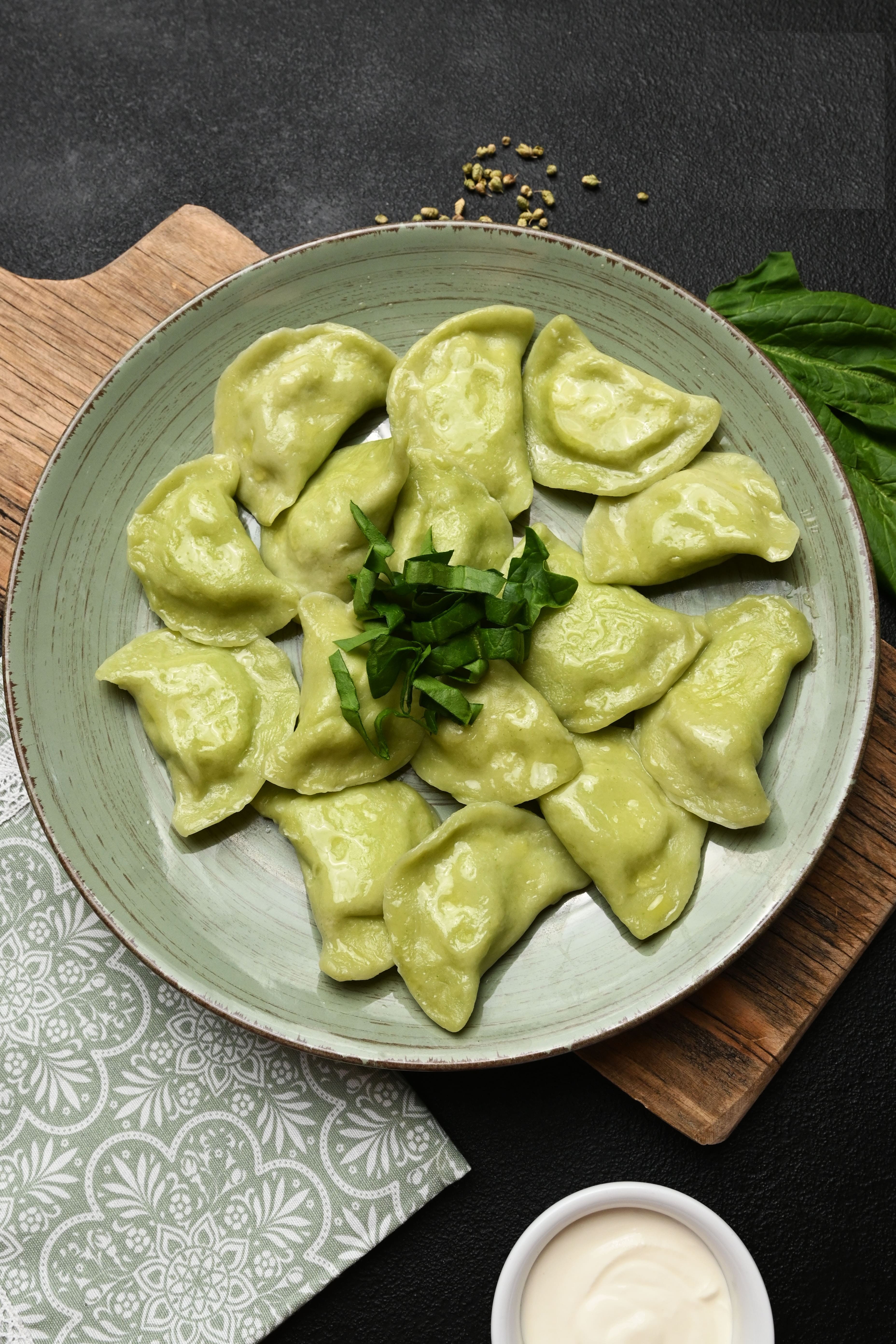 Spinach and brined cheese varenyky (dumplings)