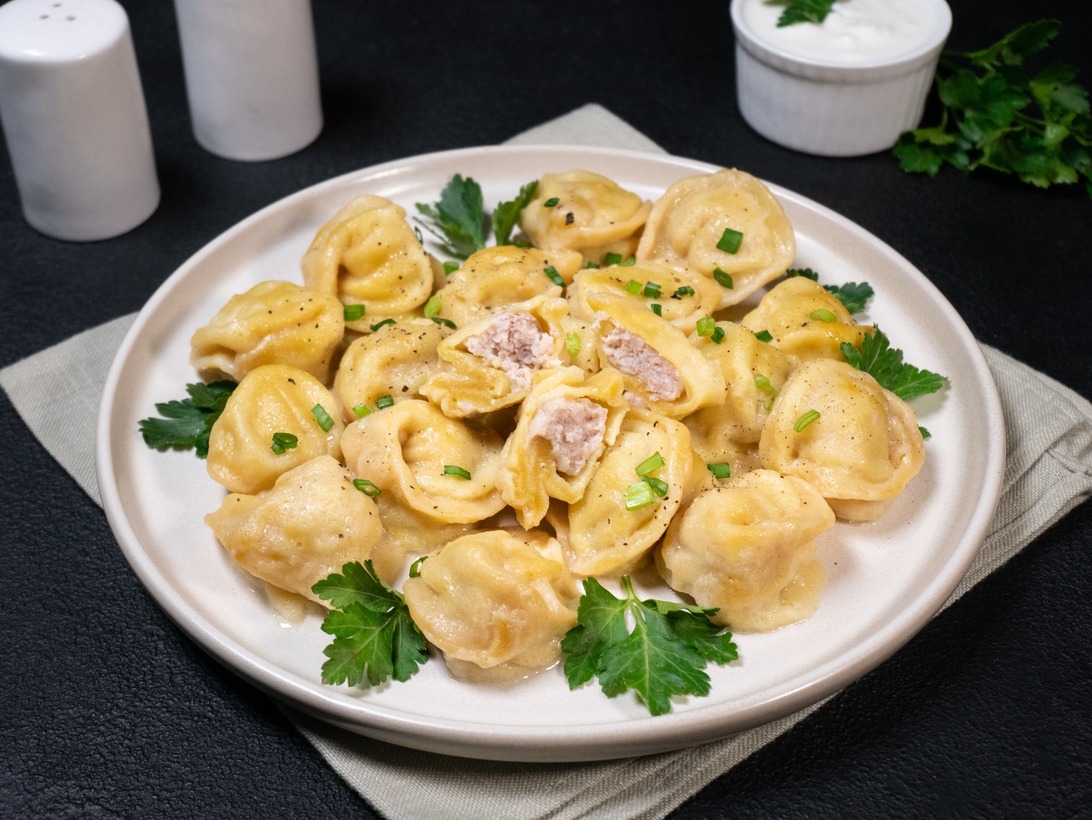 Corn-flour chicken pelmeni (meat dumplings)