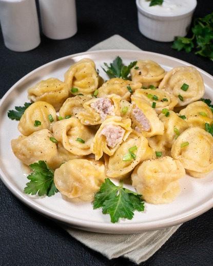 Corn-flour chicken pelmeni (meat dumplings)